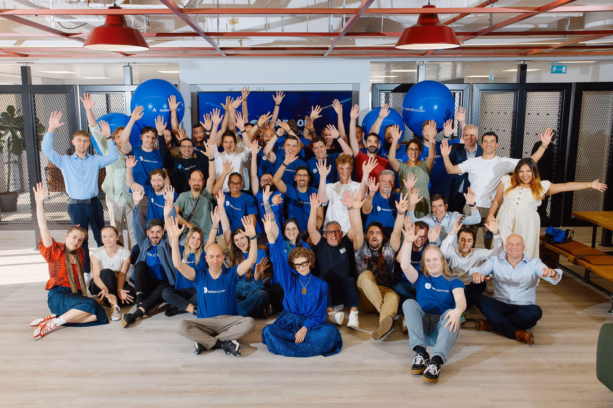 The Applied Blockchain team celebrating 10 years